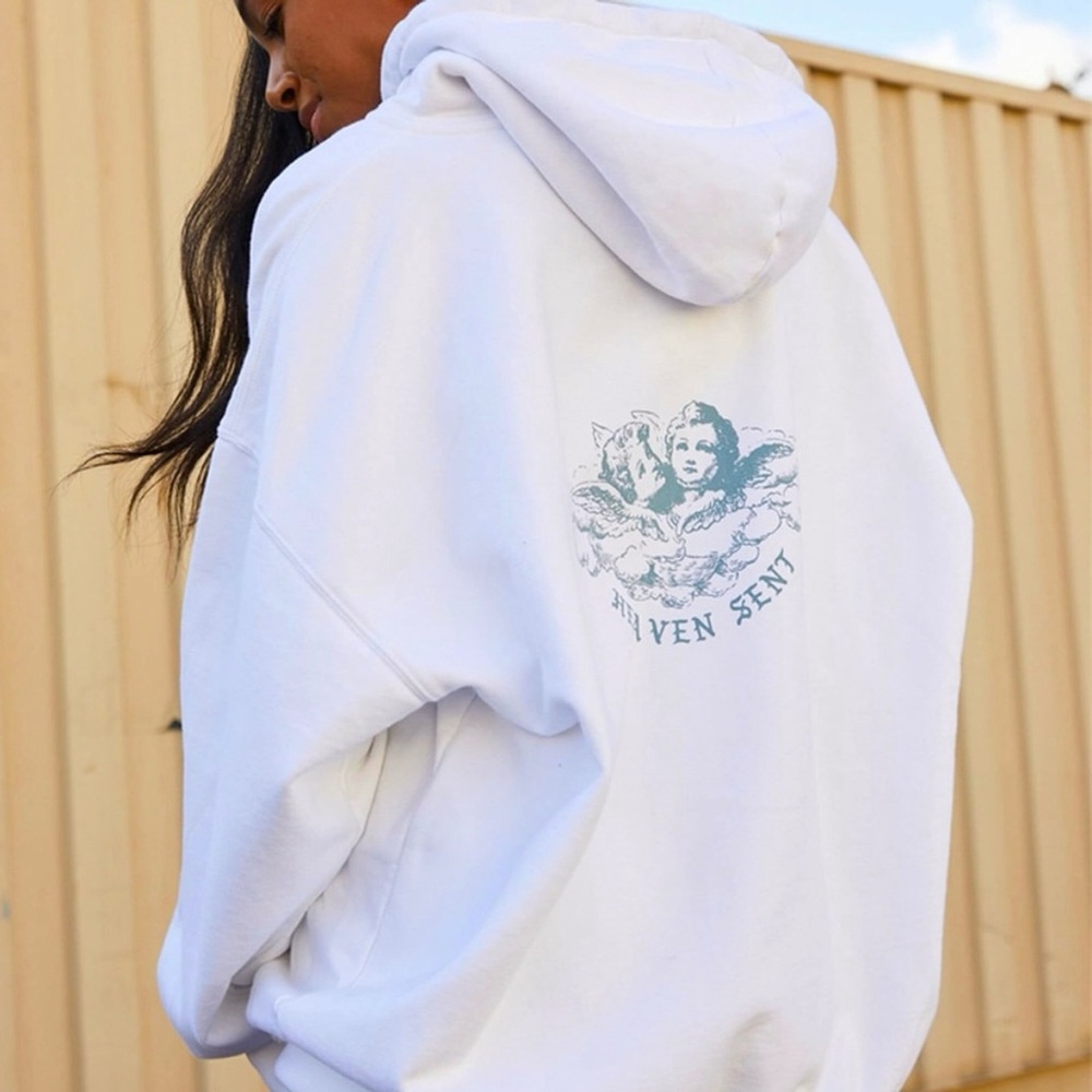 Brandy Melville White Hoodie with Pale Blue Angel Graphic